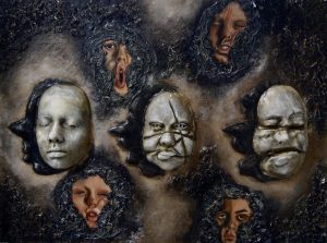 Landscape painting with seven different faces on. Four of the faces are contorted and squished and surround by black and grey swirls of raised paint.  In the middle there is three faces made of plaster casts of the artist face distorted in different ways.  