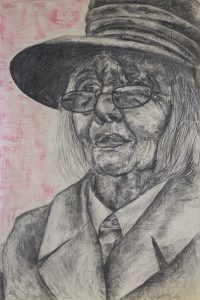 A drawing of an old woman with a large brimmed hat and glasses. 