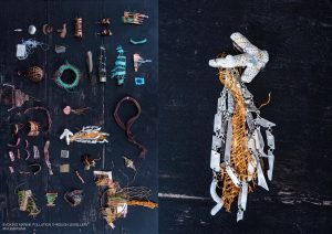 A selection of jewellery made from woven found plastic and other found beach items on a painted black wooden background. 
