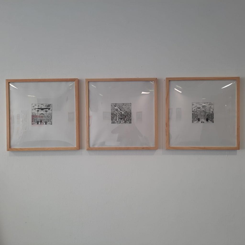 Three framed ink line drawings. Each drawing is of a scene of Japan??? Before, during and after a disaster.   
